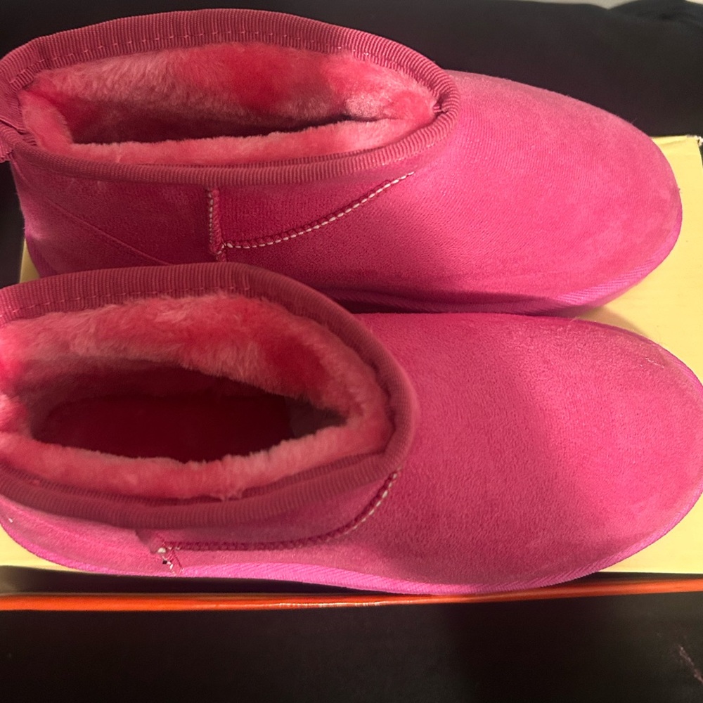 Pink furry boots
